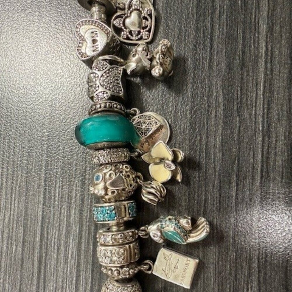 Authentic S925 Pandora Bracelet with 30 charms in excellent Preloved condition - Picture 4 of 9